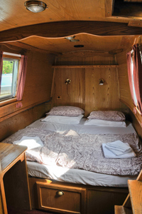 The king sized double bed in its own private bedroom, standard equipment on all our canal boats